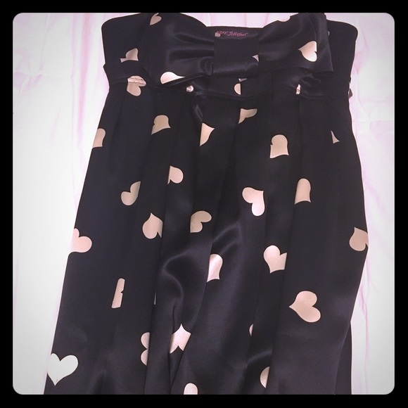 Betsy Johnson dress and pink shirt with black bow.