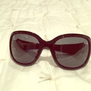 Women's Oakley polarized athletic sunglasses.