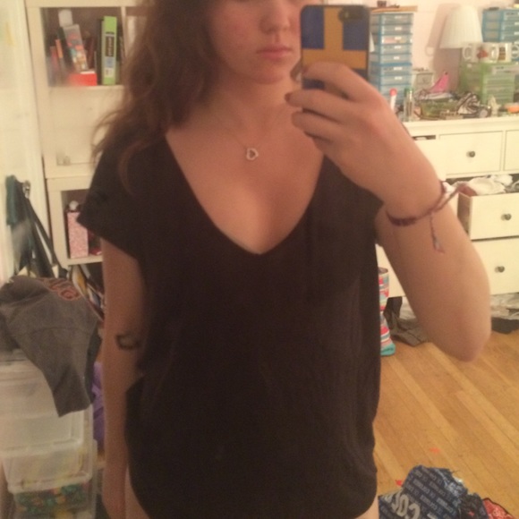 Black top with a deep V neck