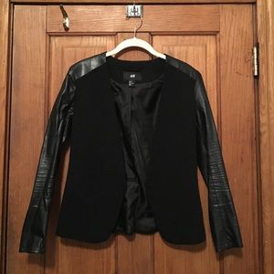 Jacket with vegan leather sleeves