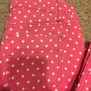 Super cute pink and white polka dot skinny jeans