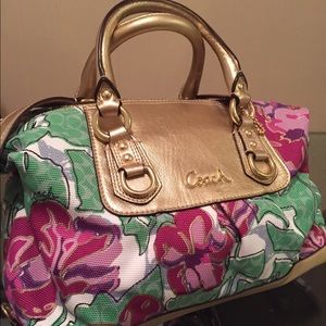 Brand new never worn floral print coach bag.