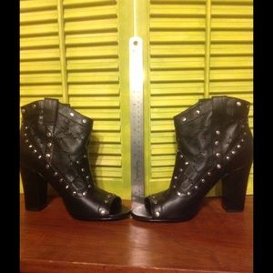 Leather open toe mini boot.