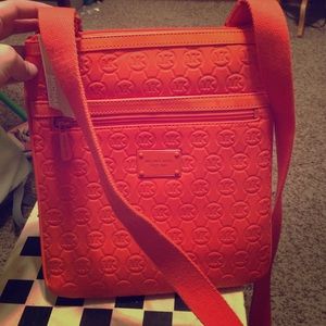 Authentic Michael Kors crossbody electronic bag