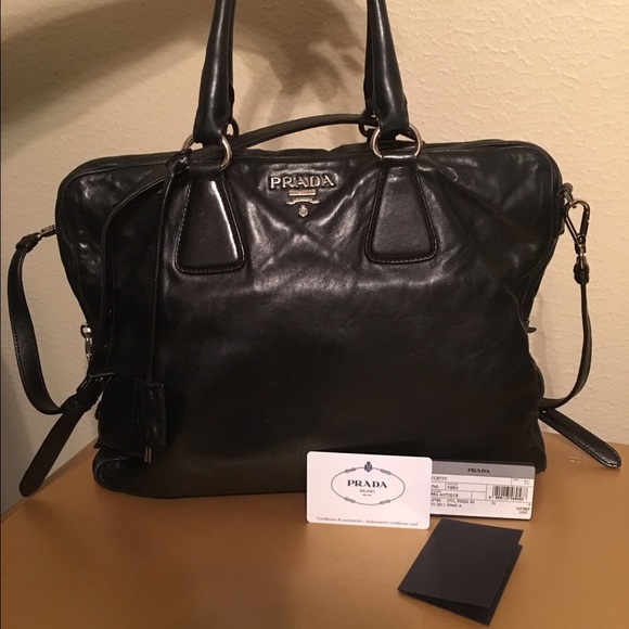 Authentic Prada Black Handbag with double handles. - Picture 1 of 4