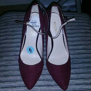 Dark  burgundy wedges. Wore it once.