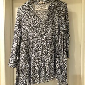 Cotton button down flows shirt.