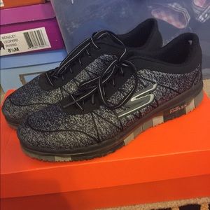 Black and gray tennis shoes