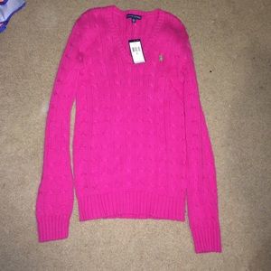 Pink polo cable knit sweater.
