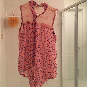 Pink blouse with blue bows for decoration