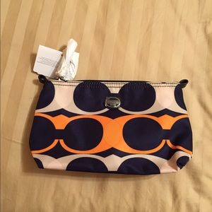 NWT coach makeup bag in blue, white and orange