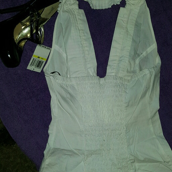 White backless tuxedo shirt very cute. Never worn