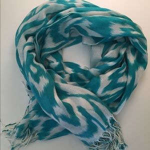 Teal and white patterned scarf