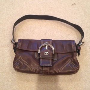Brown leather coach purse