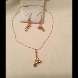 Gold ball necklace with matching earrings