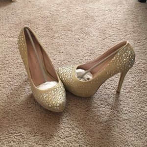 Gold rhinestone pumps