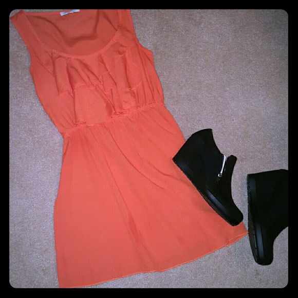 Dresses & Skirts - SOLD Orange boutique dress. So cute!!