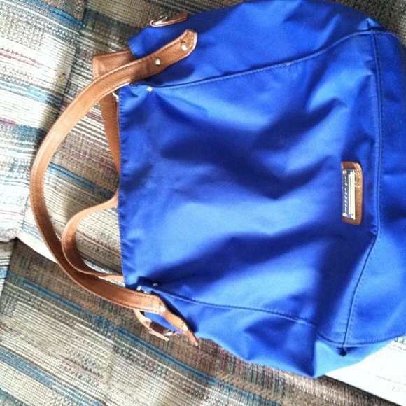I'm selling a madden girl blue and brown purse.