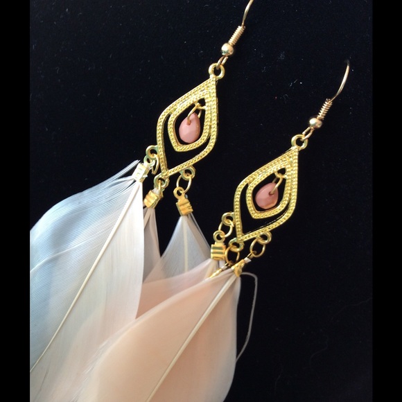 Cream color brand new without tags plume earrings