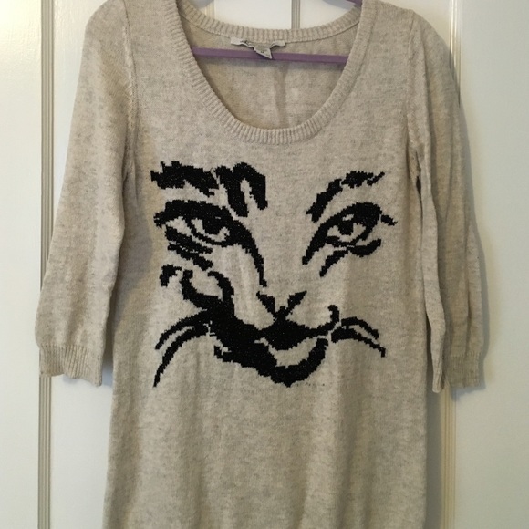 American Rag. "Cat eye" tunic sweater