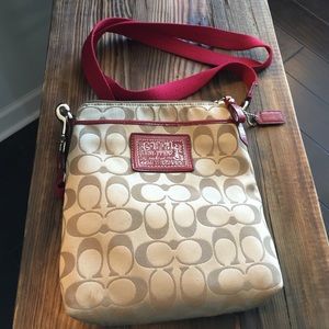 Gold coach cross body purse