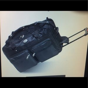 Monogrammed rolling duffel bag