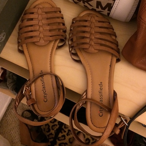 Brown gladiator sandals.