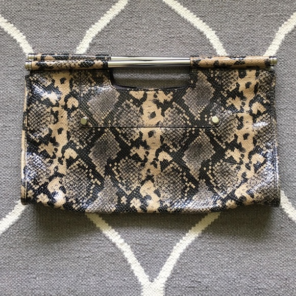 BR clutch tan/black leather snake skin design