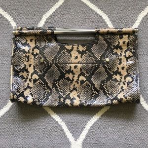 BR clutch tan/black leather snake skin design