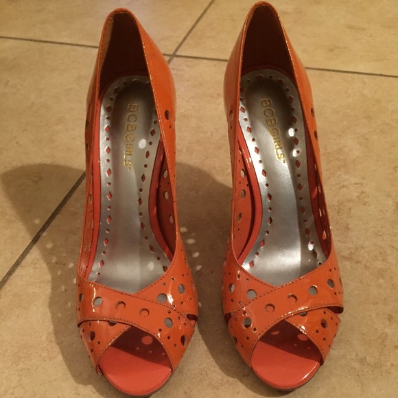 Orange heels.  Size 6. BCBGirls. New never worn.