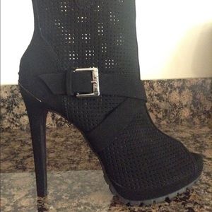 Size 6 black juicy couture booties with buckles.