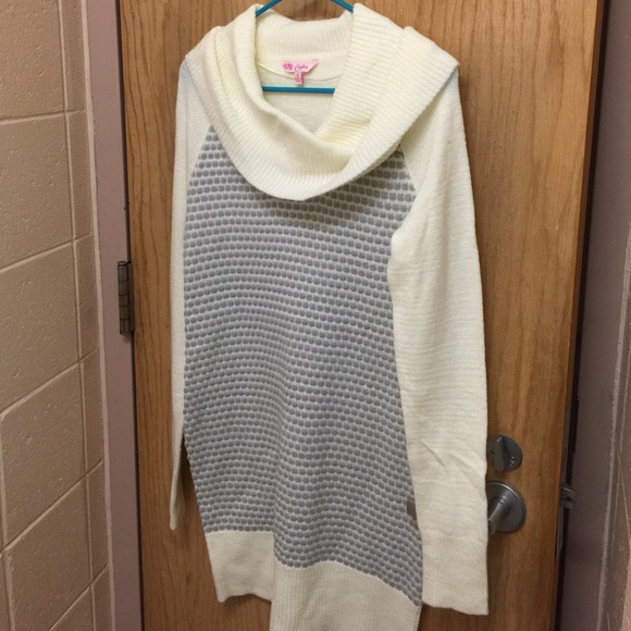 Long white sweater.
