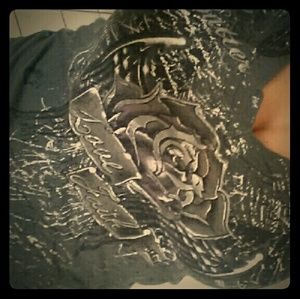 Grey brad butter shirt.