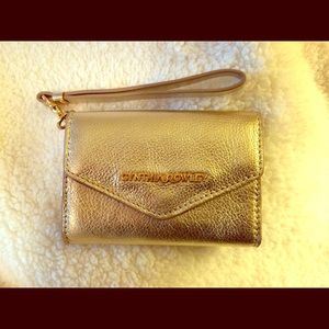 Metallic gold wristlet. NWOT