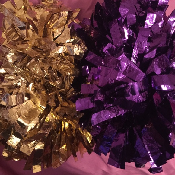One purple and one gold Pom Pom