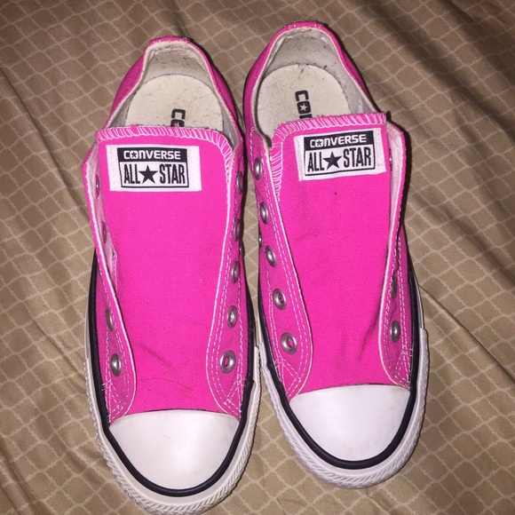 Pink converse shoes.