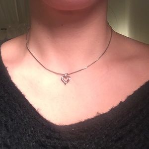 White gold heart pendant with small diamonds