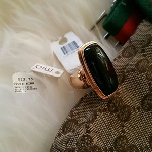 Dark stone colored ring
