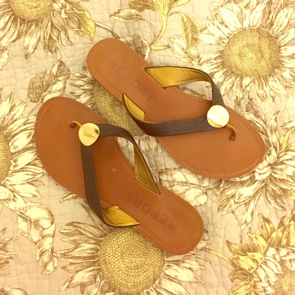 Black sandals with gold detail