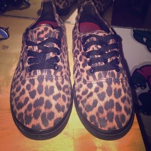 Leopard print vans.
