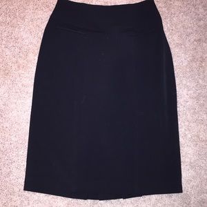 High waisted black pencil skirt with pleat detail