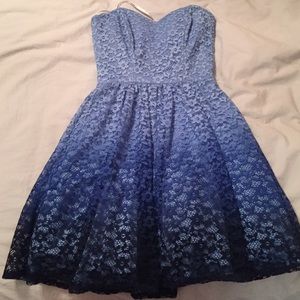 Ombré blue strapless dress.