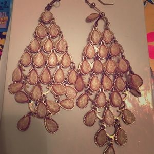 Rose pink dangling earrings.