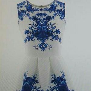 White dress with blue flowers