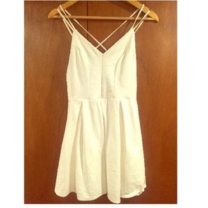 Creme colored Charlotte Rousse Dress. Fits medium.