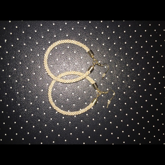 Gold hoop earrings. Never worn!