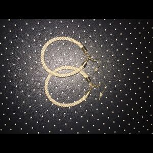 Gold hoop earrings. Never worn!