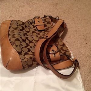 Tan Coach bag.