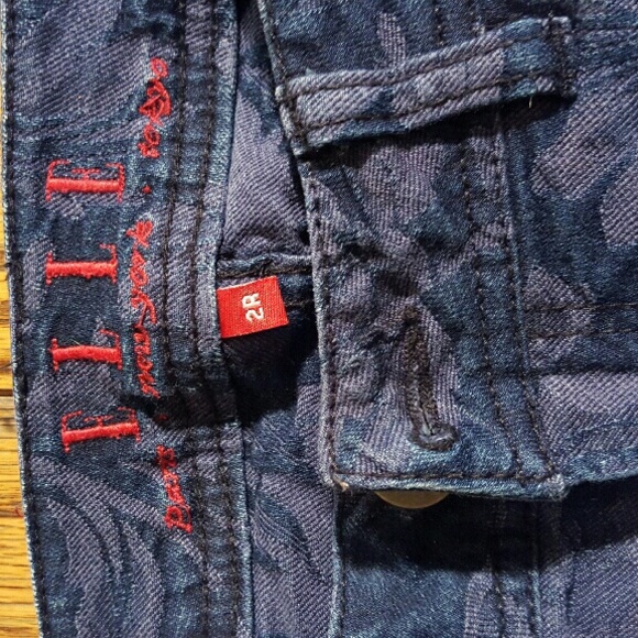 Dark blue, floral background, straight leg jeans