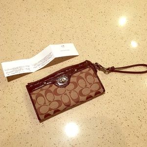 Coach Wristlet Wallet, practically new.